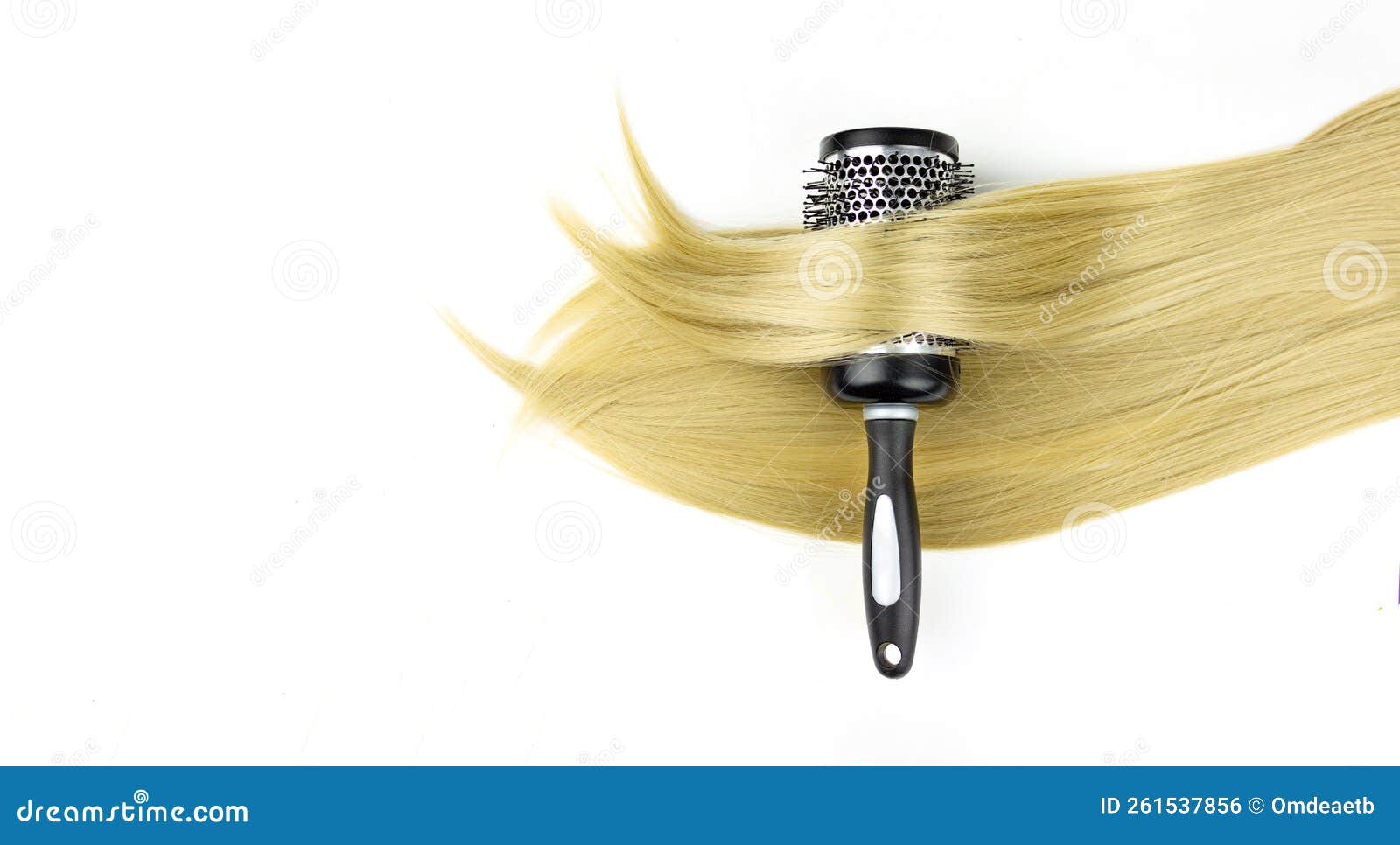 Round Brush Combs with Long Blond Hair Closeup. Round Hair Brush with