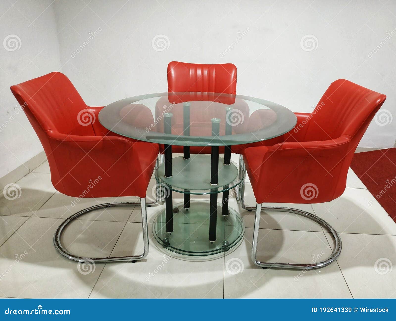 Round Glass Table with Red Chairs Stock Image Image of decoration