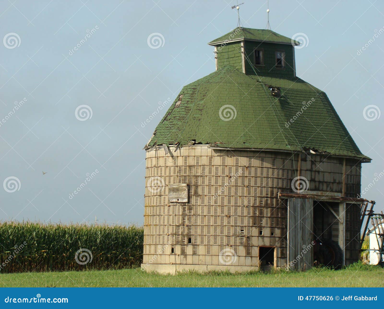 Round green top corn crib stock photo. Image of exterior 47750626