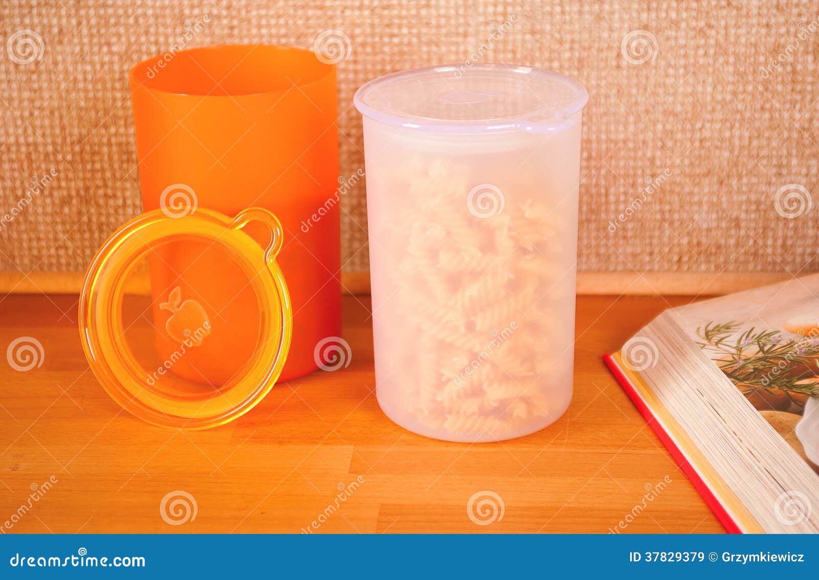 Round kitchen containers stock image. Image of orange 37829379