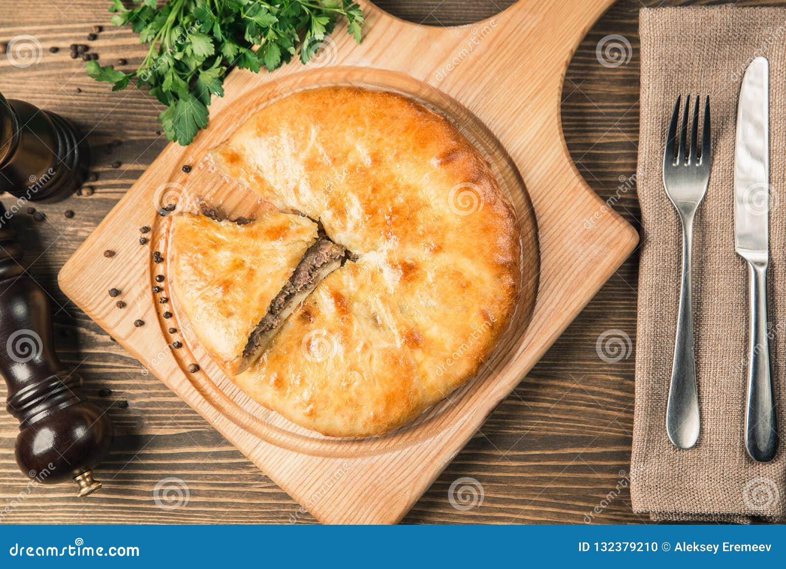 Round Meat Pie. Traditional Dish of the Cuisine of the Caucasus Stock