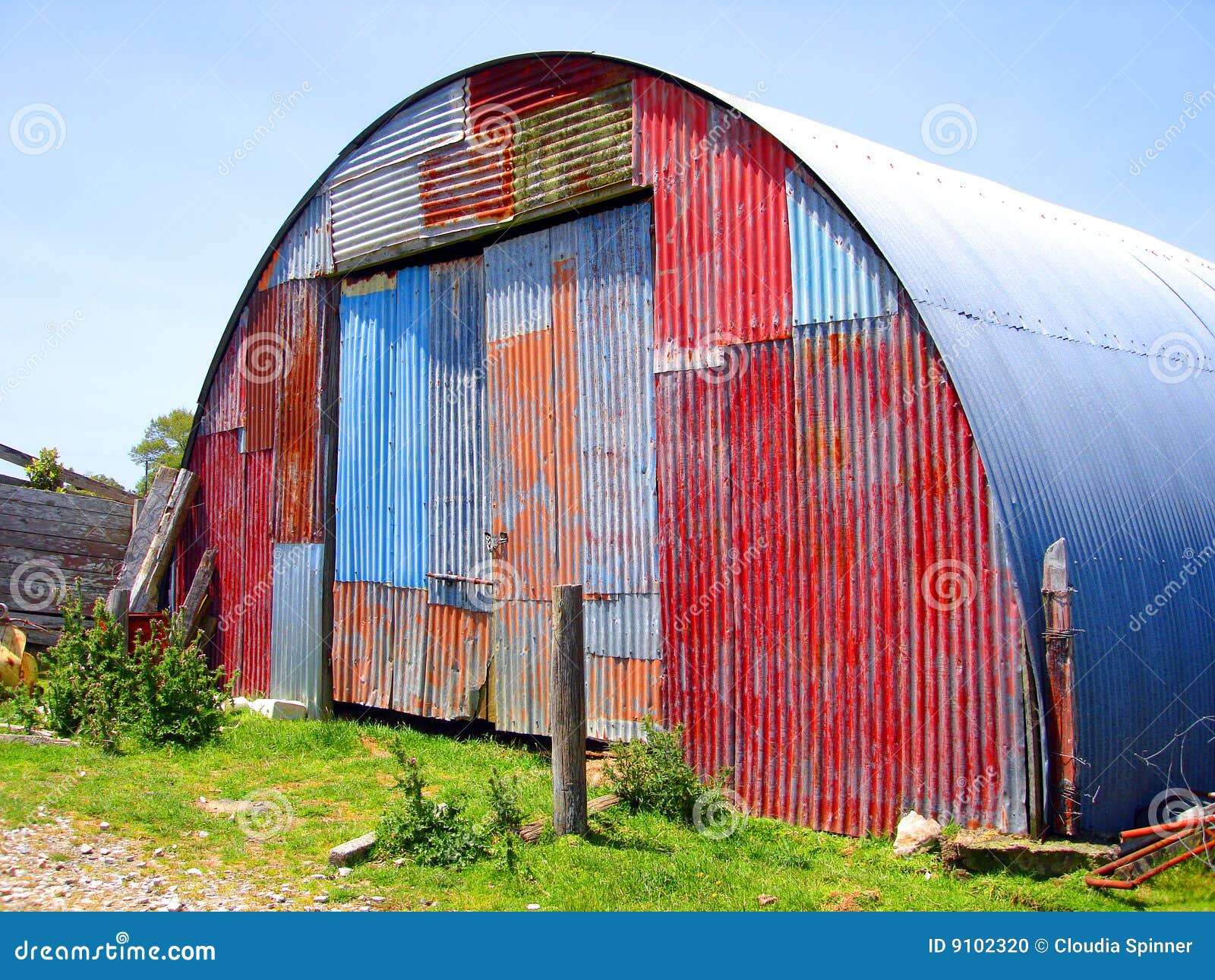 Round Metal Shed With Mismatched Paint Stock Photo - Image 