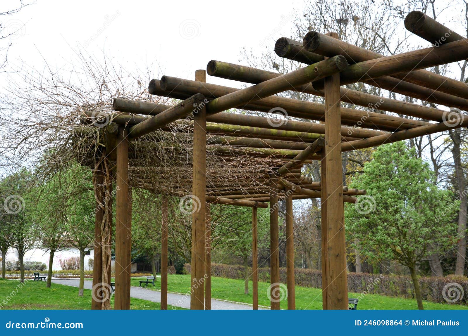 Round Pergola, Trellises Made of Wooden Poles Around the Sandpit ...