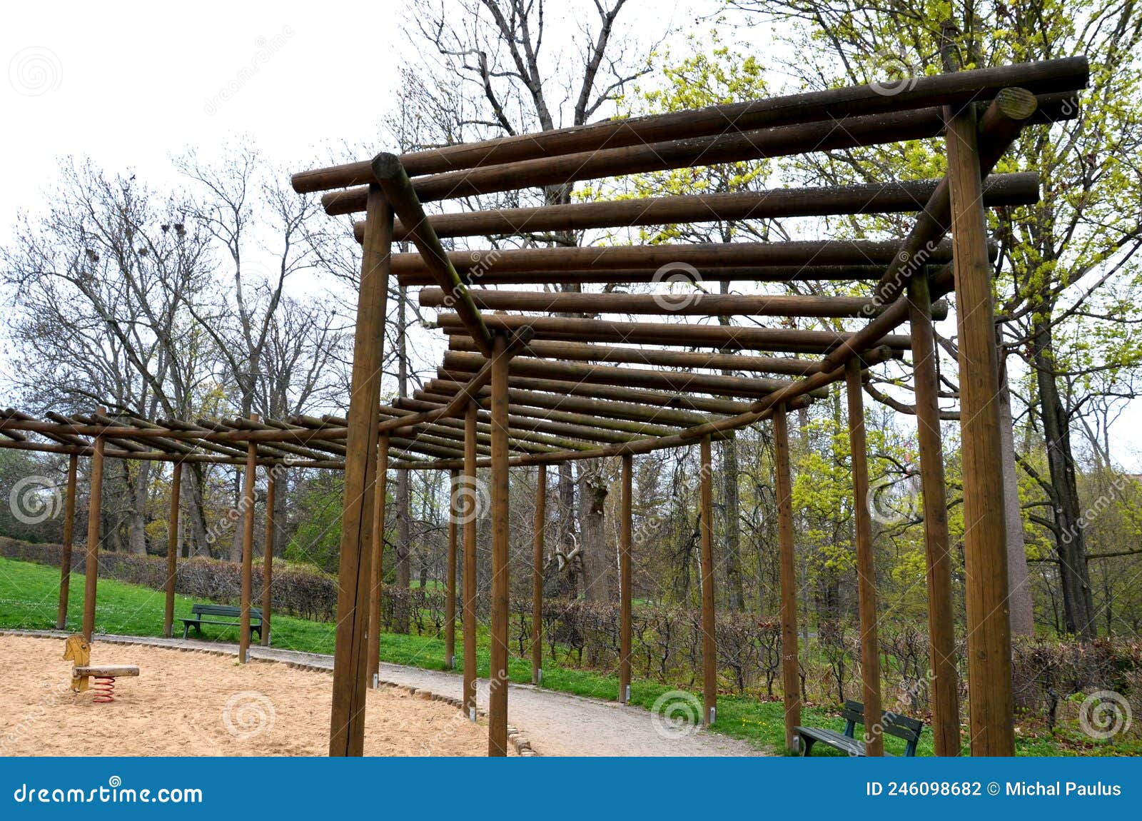 Round Pergola, Trellises Made of Wooden Poles Around the Sandpit ...