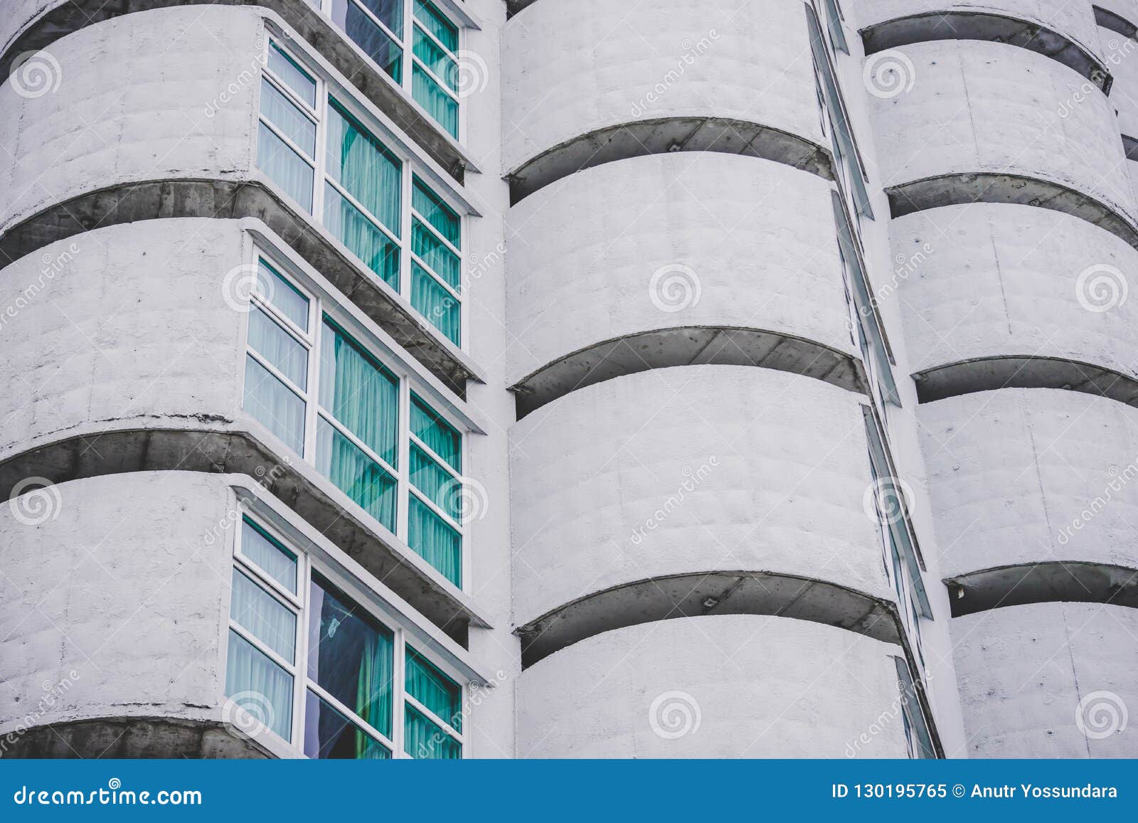 rounded  comercial building with windows