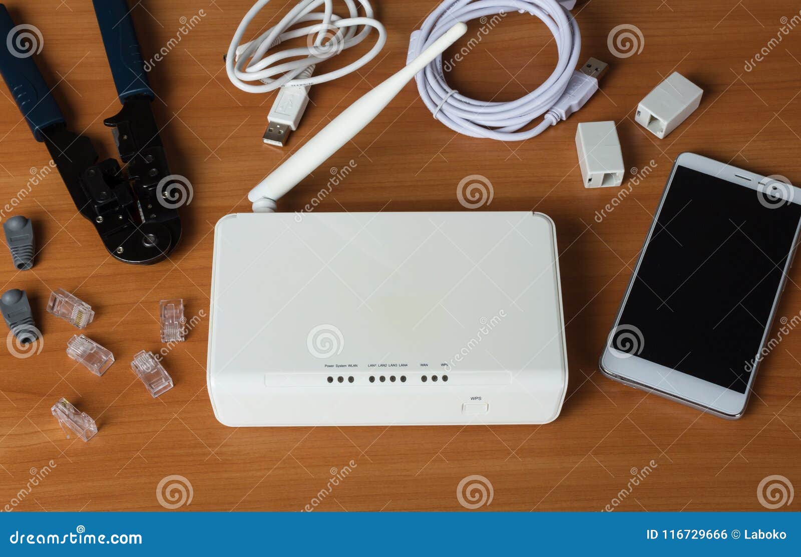 Router, Clipper and Accessories for Connecting Network Cable on Table