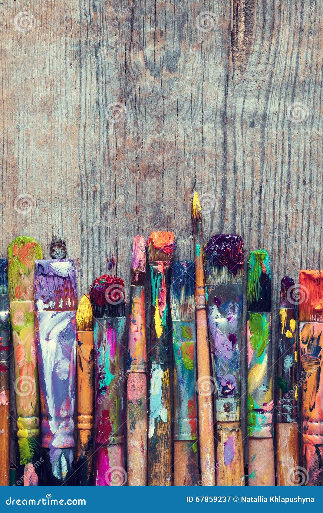 row of artist paint brushes closeup