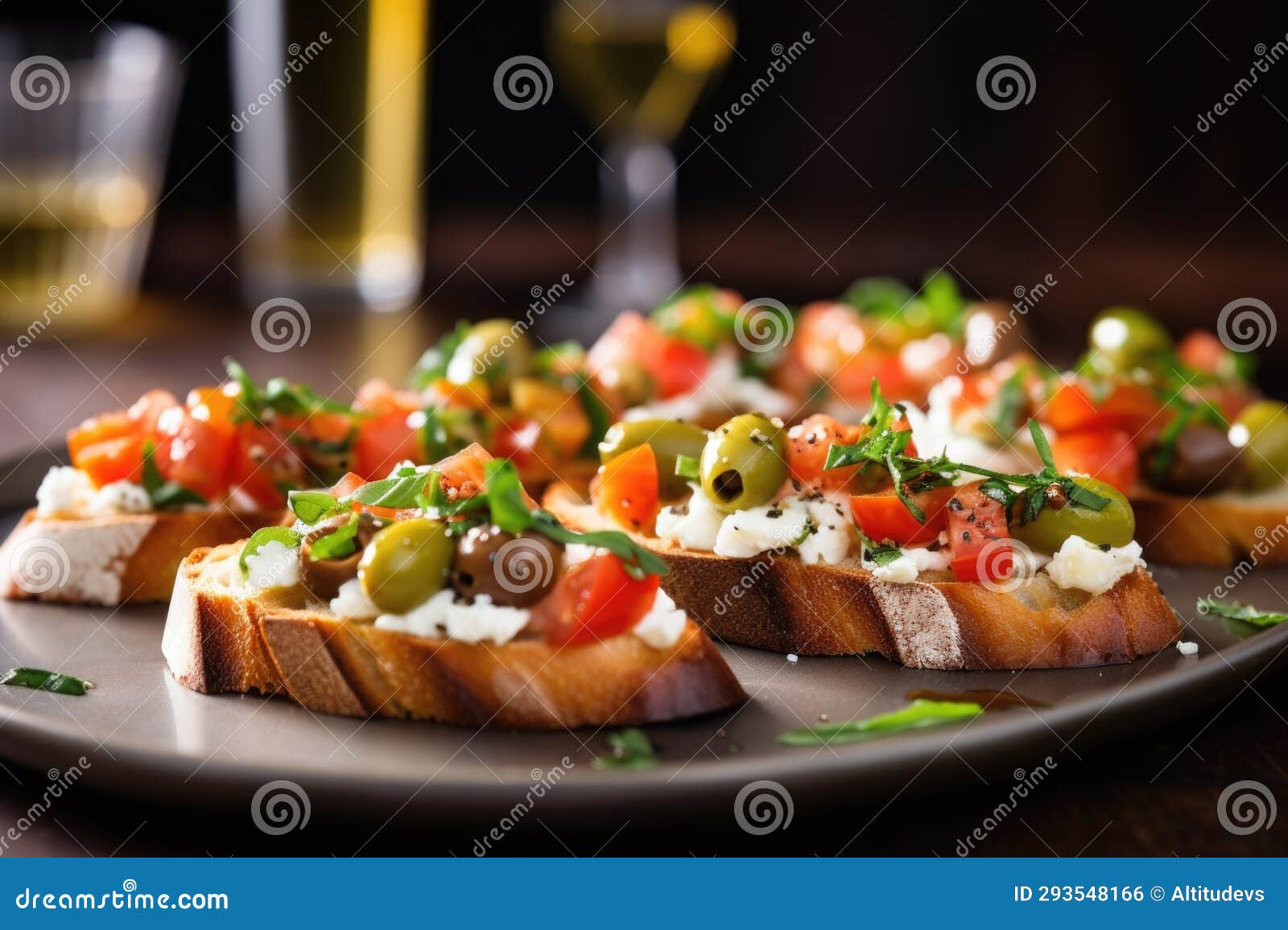 A Row of Bruschetta with Ricotta and Green Olives on a Silver Plate ...