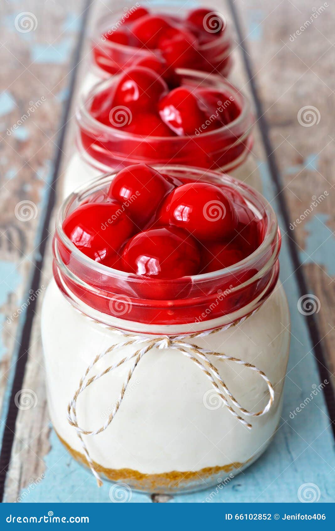Row Of Cherry Cheesecakes In Mason Jars Stock Photo Image of baking