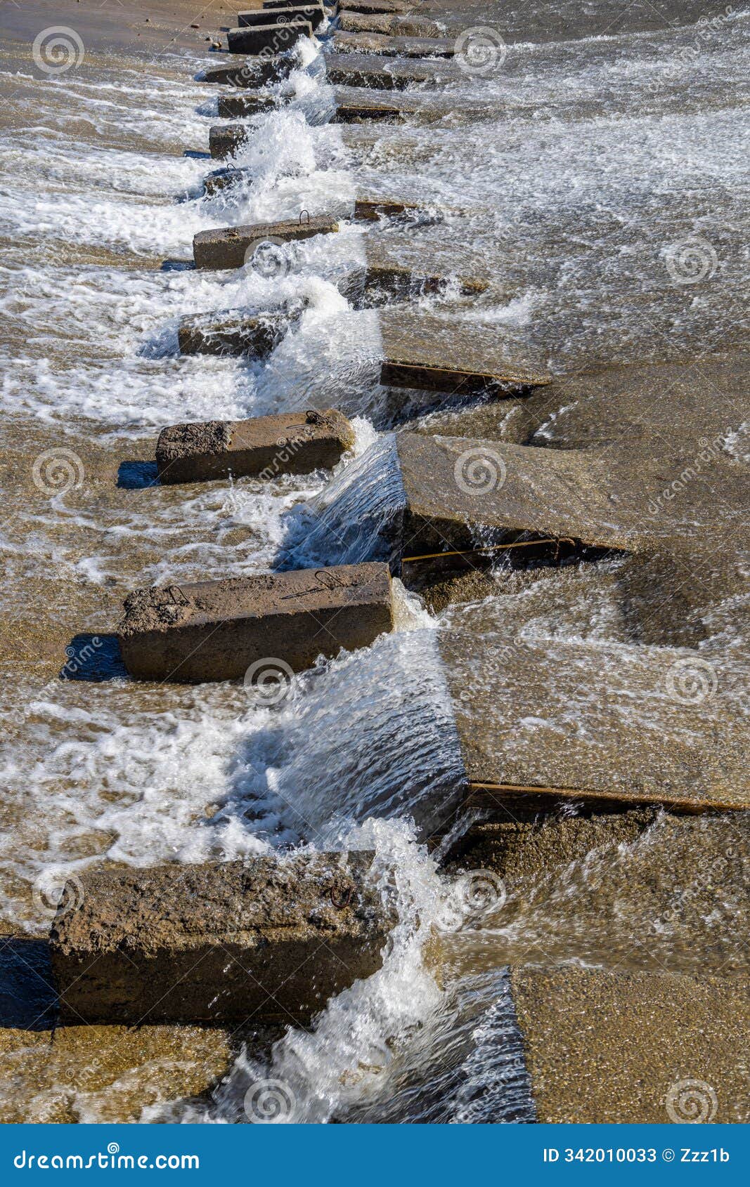 chute dentate blocks in concrete water spillway channel