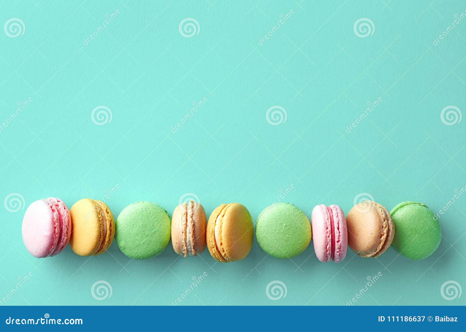 Colorful French Macarons on Blue Background Stock Image - Image of ...