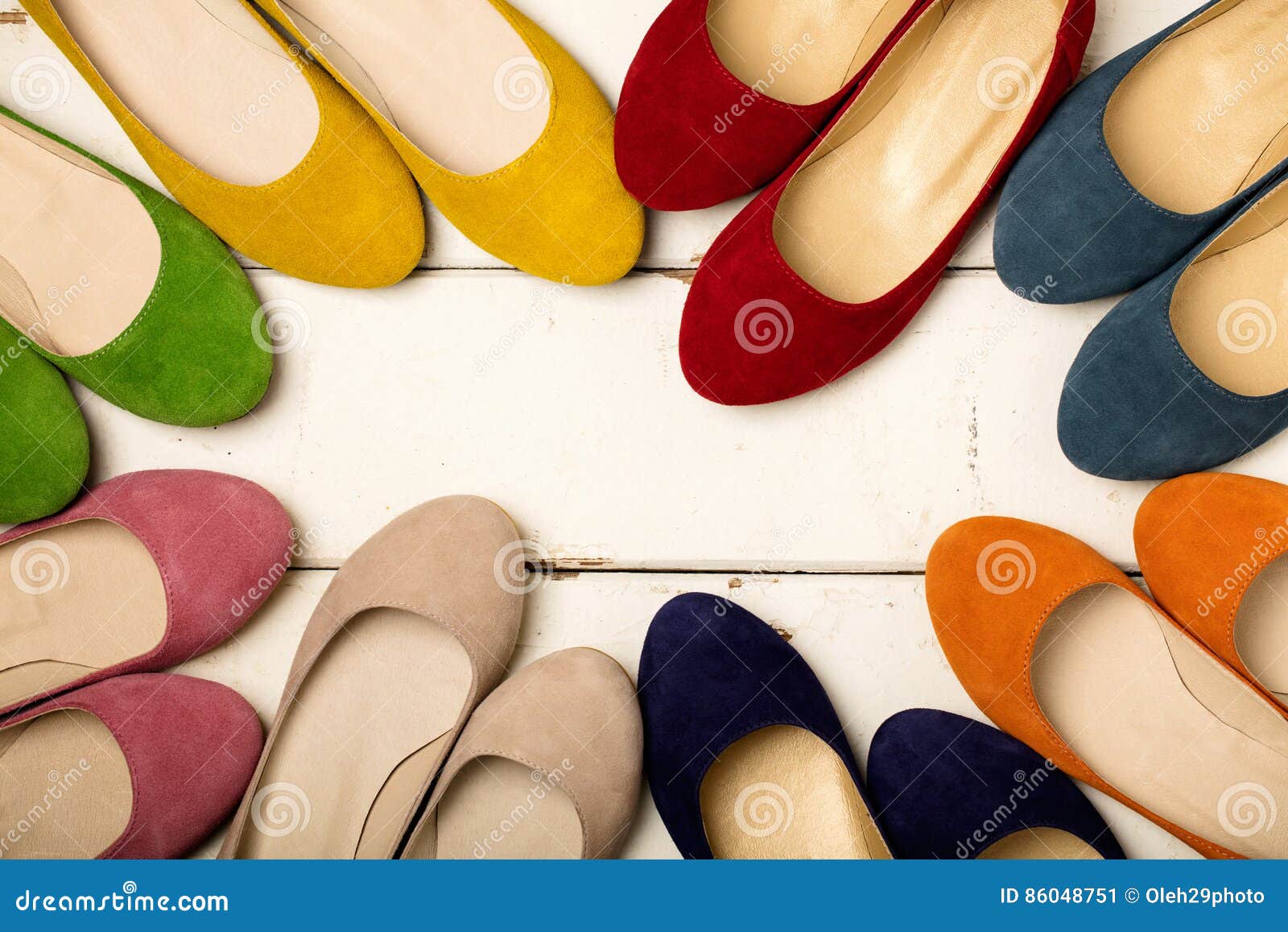 Row of Colorful Shoes Ballerinas on a White Wooden Background. Stock ...