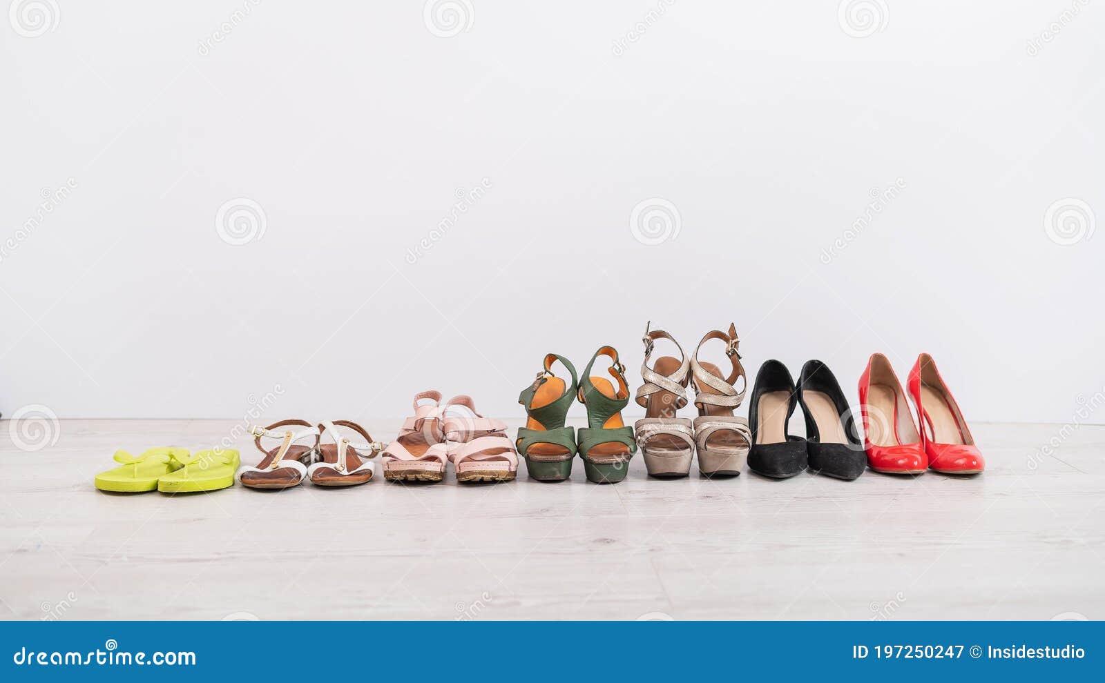 A Row of Different Women`s Shoes on a White Background Stock Image ...