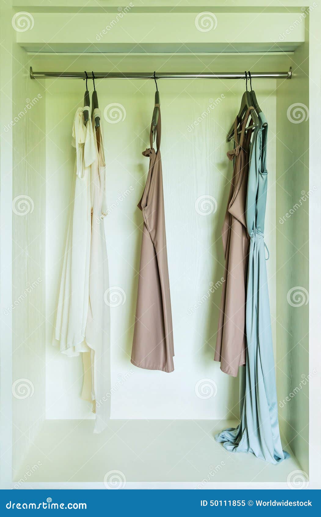 Row of Dress Hanging on Coat Hanger Stock Image - Image of design ...