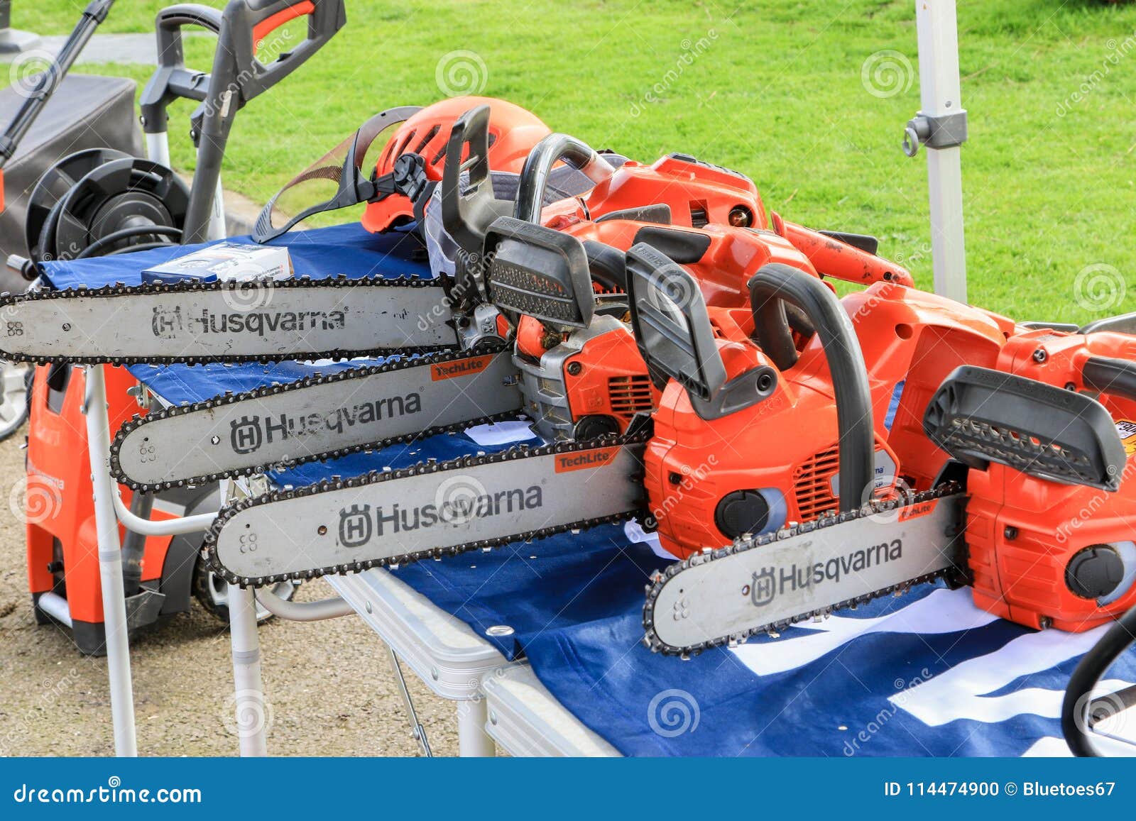 A Row of Electrical Petrol Chainsaws Editorial Image Image of