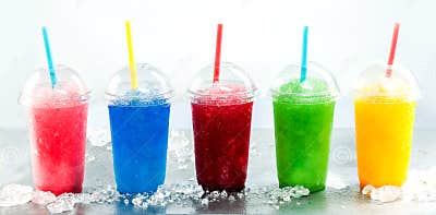 Row of Frozen Fruit Slushies in Plastic Cups Stock Photo - Image of ...