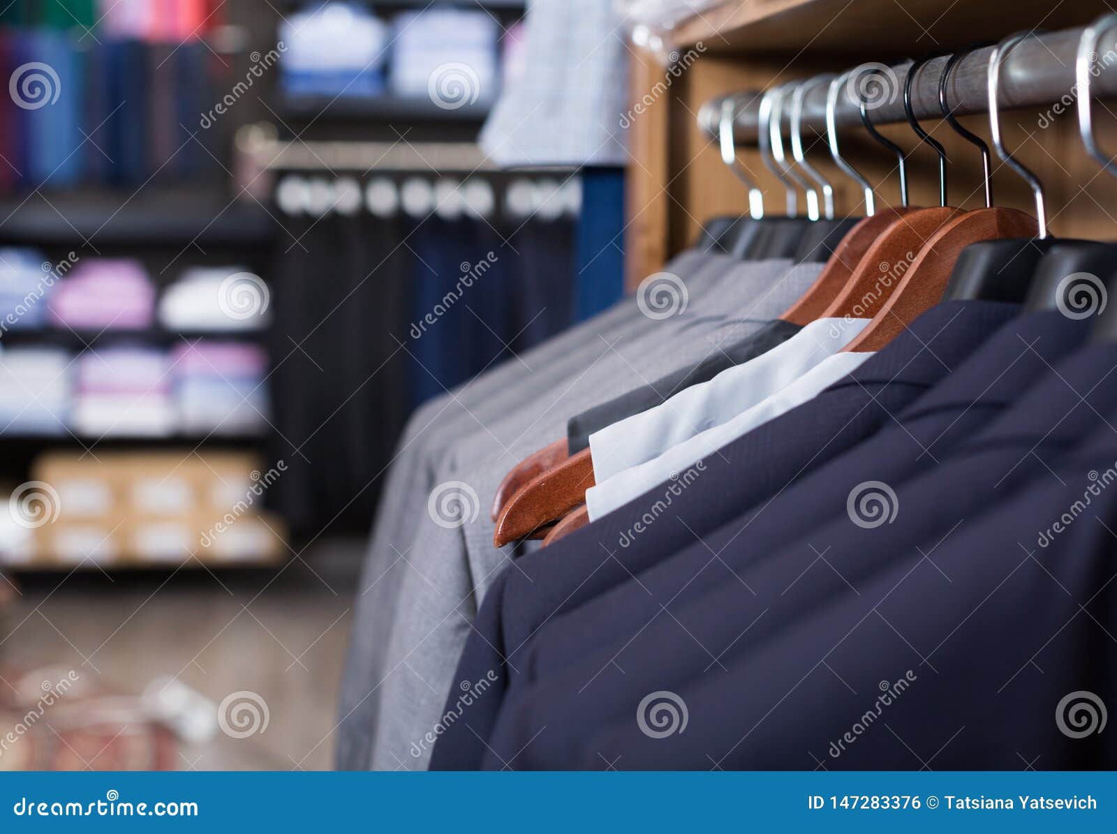 Row of Jackets on Hangers in Men Clothing Store Stock Photo - Image of ...
