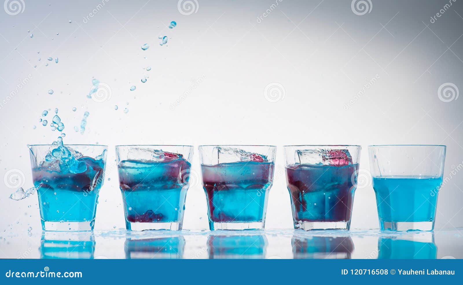 Row Line of Cup and Shot Glasses Stock Photo Image of cold, straw