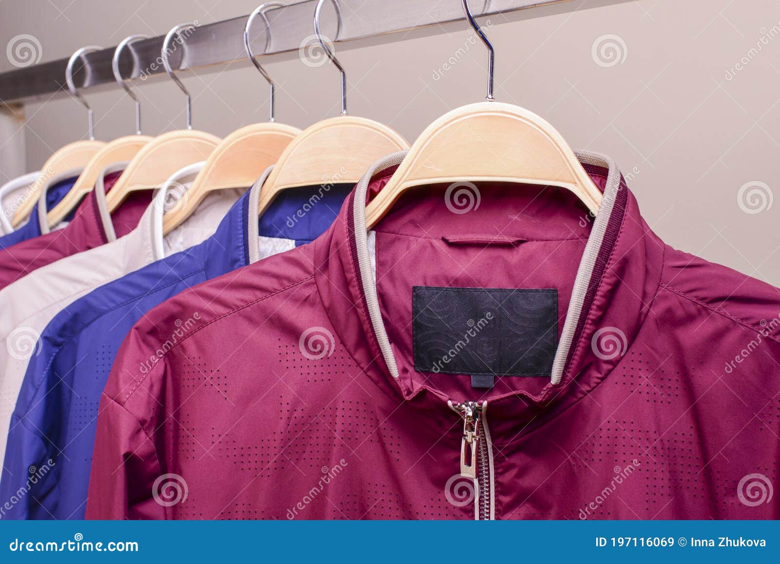Row of Many Different Colorful Hoodie Jackets, Sport Jackets for