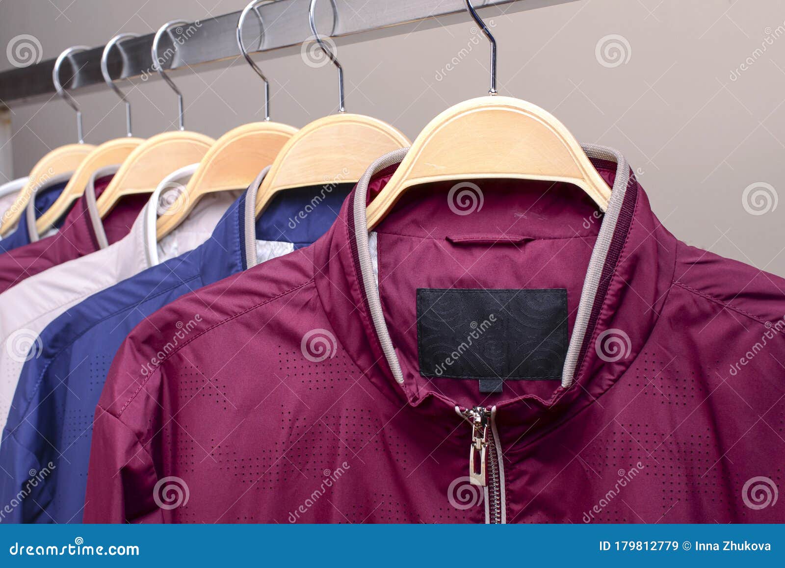 Row of Many Different Colorful Hoodie Jackets, Sport Jackets for