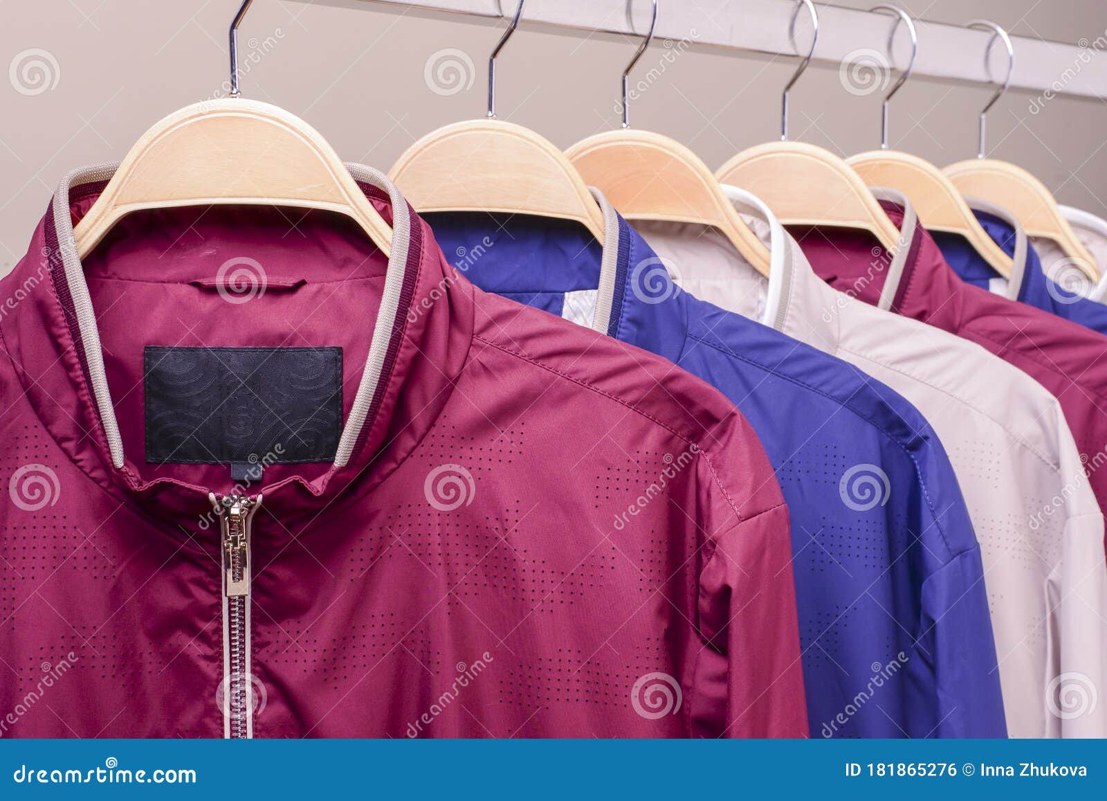 Row of Many Different Colorful Hoodie Jackets, Sport Jackets for