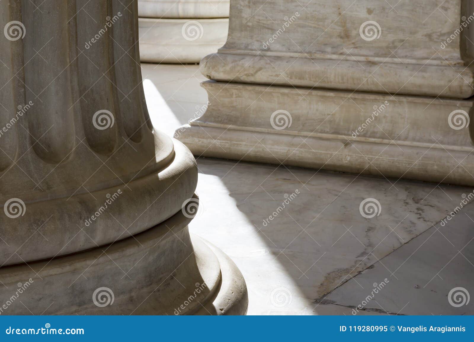 row of marble columns in an entrance