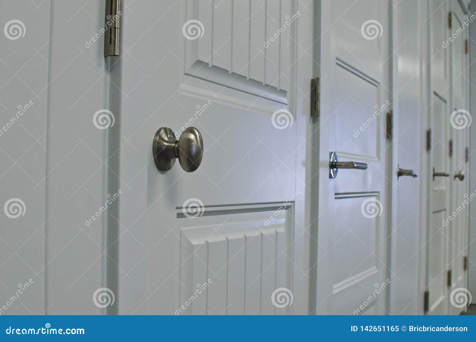 A Row Of Nickel Knobs Of The New Display Doors Stock Image