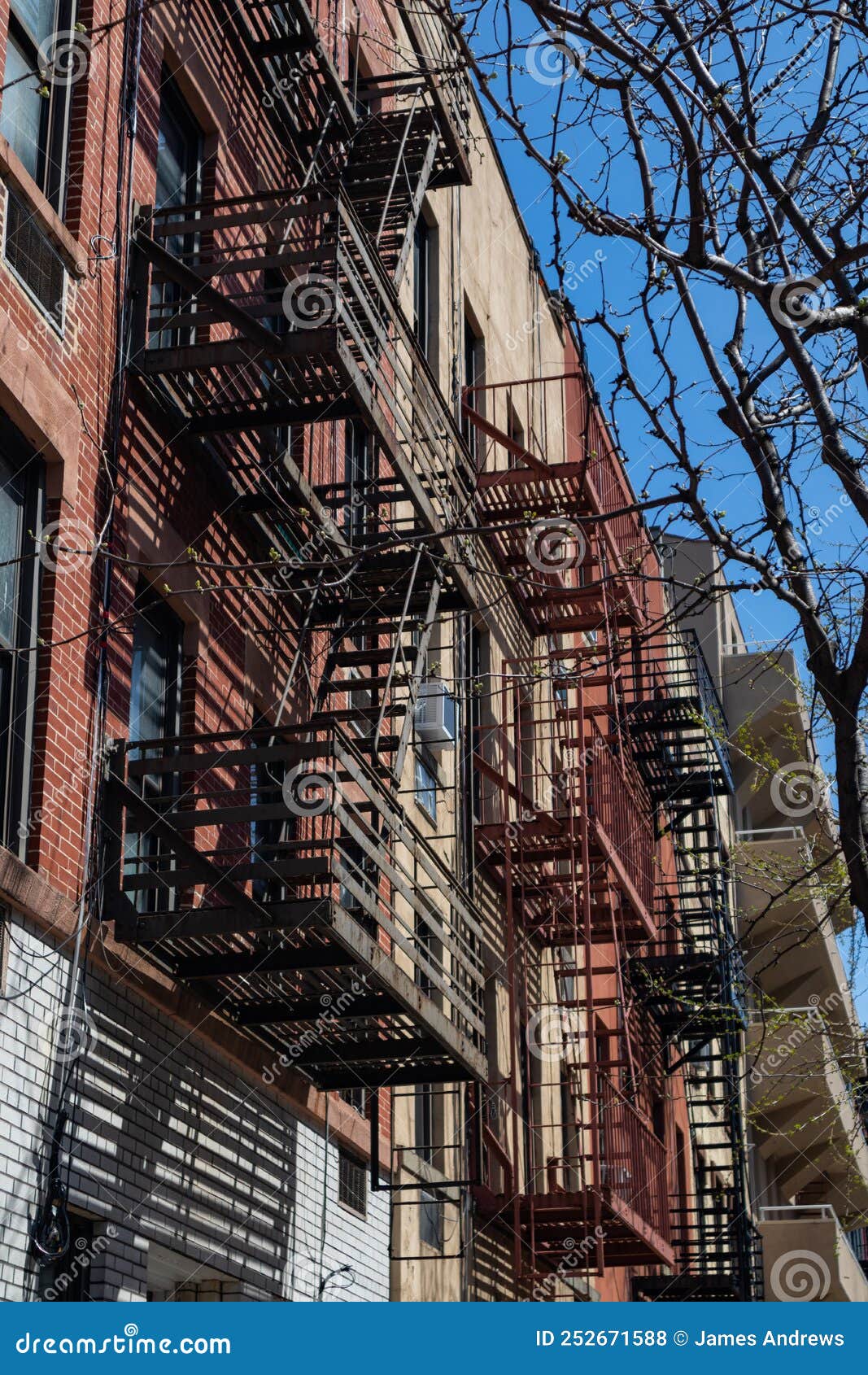 Row of Old Apartment Buildings with Fire Escapes on the Upper East Side ...