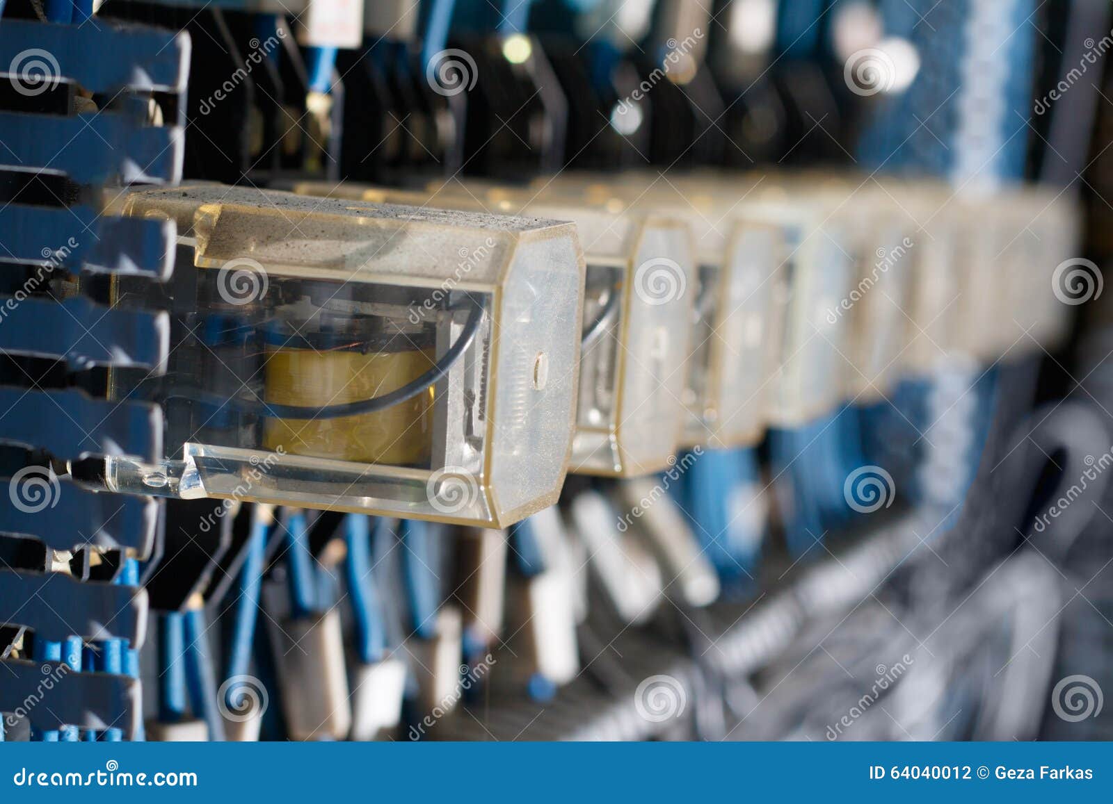 Row of old Relay actuators stock photo. Image of manufacturing 64040012