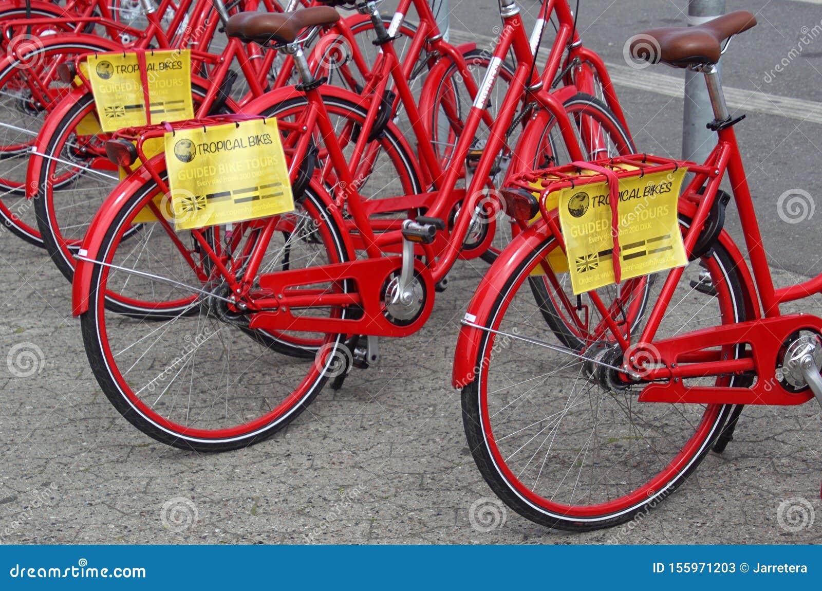 Row of Red Guided Rental Bikes: Tropical Bikes Editorial Stock Photo - of tour: 155971203