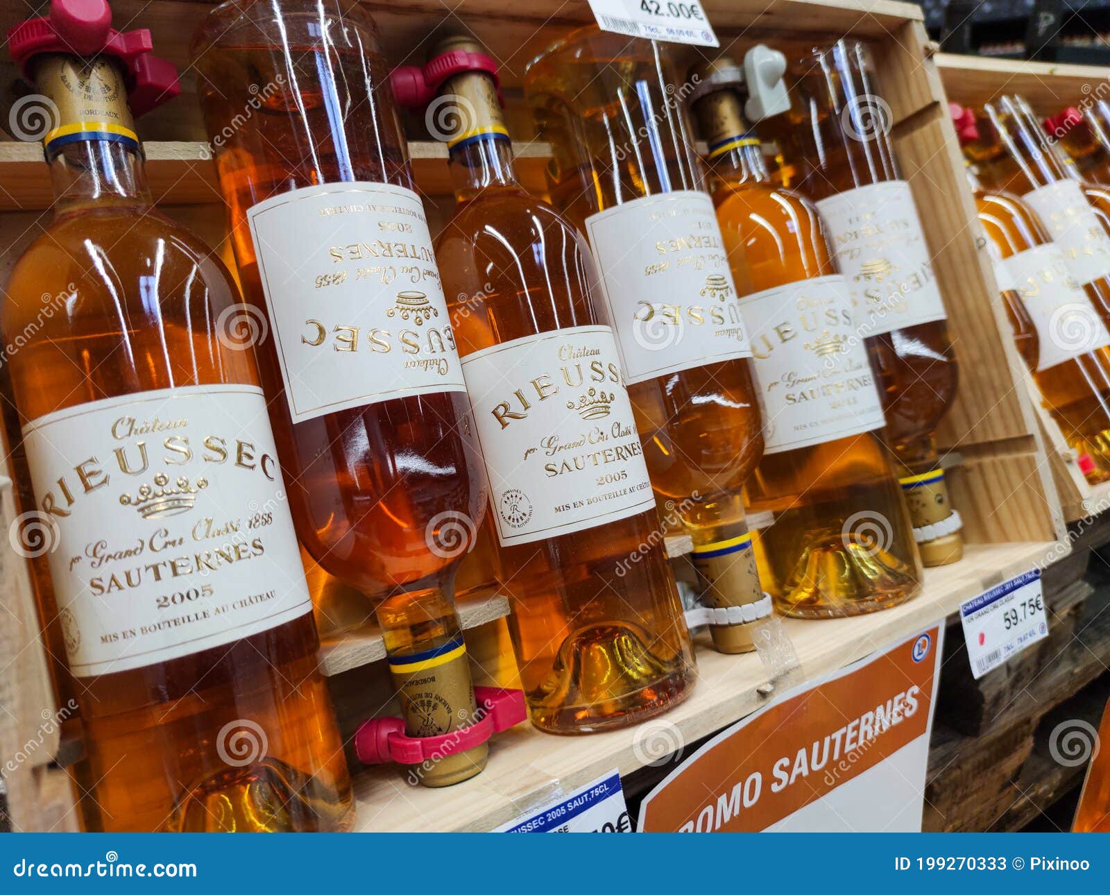 Row of Sauternes Bottles, French Sweet Wine Display for Sell in the ...