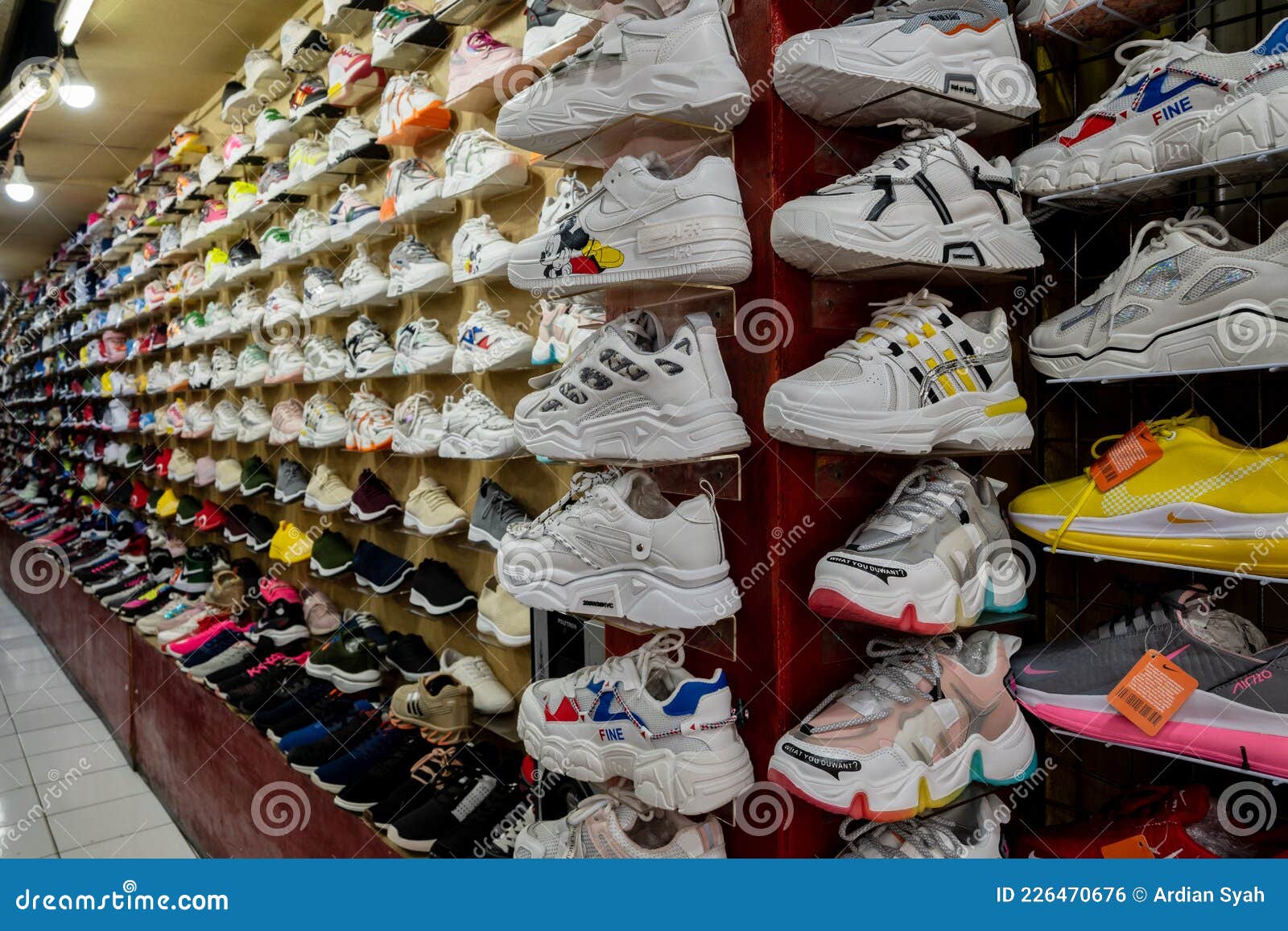 A Row of Sneakers at the Flea Market, in the Alun Alun Area, Bandung. Photo - Image of 226470676