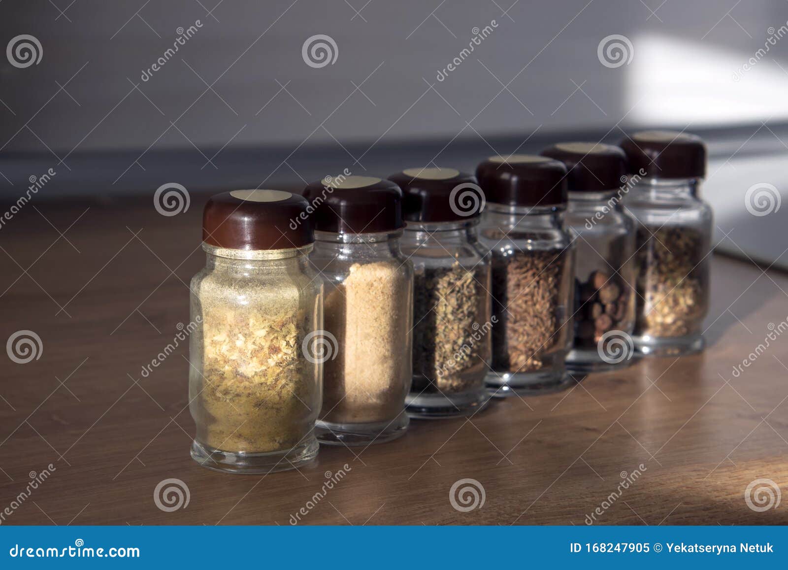 Row of Spice Jars Containing Various Herbs and Spices Stock Image Image of mixed, line 168247905