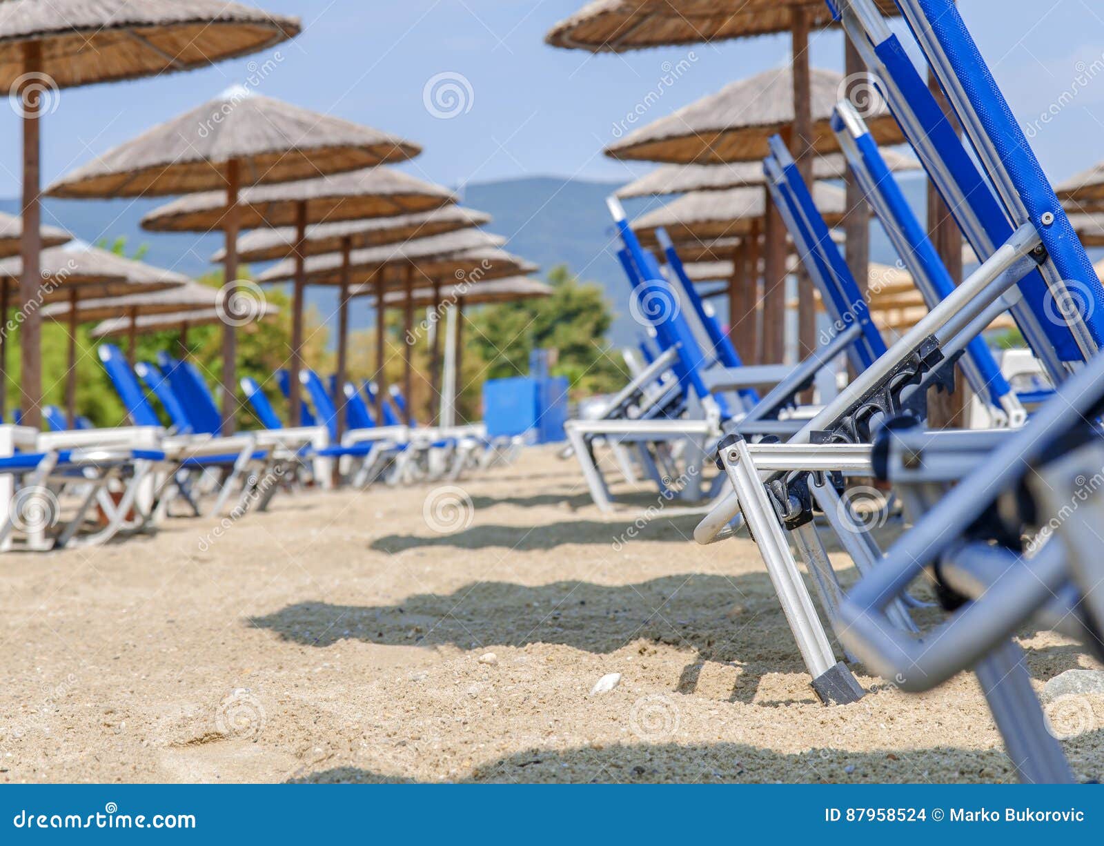 Row of Sunbeds and Towels at a Beach Resort Stock Photo Image of pier