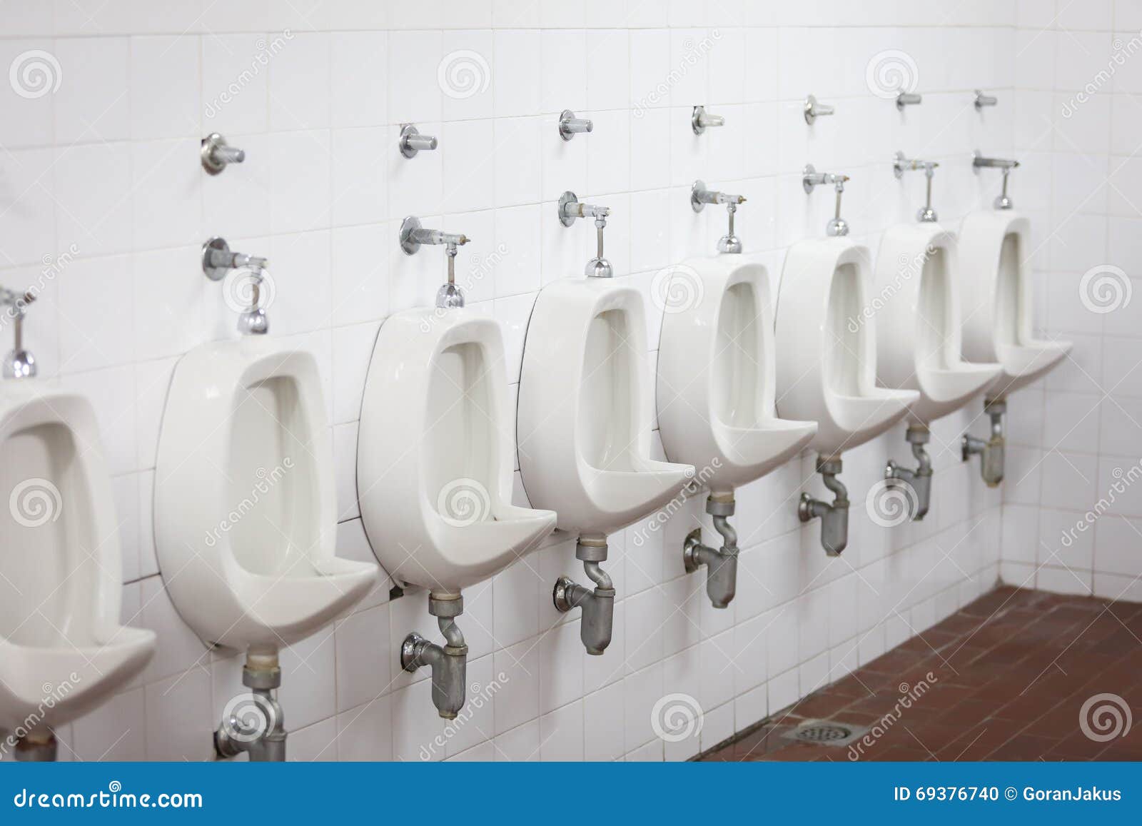 Row of urinals stock photo. Image of restroom, urinals 69376740