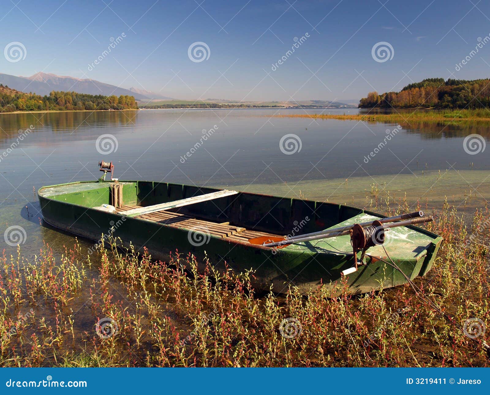 Rowing boat by lake stock image. Image of lake, trees 3219411