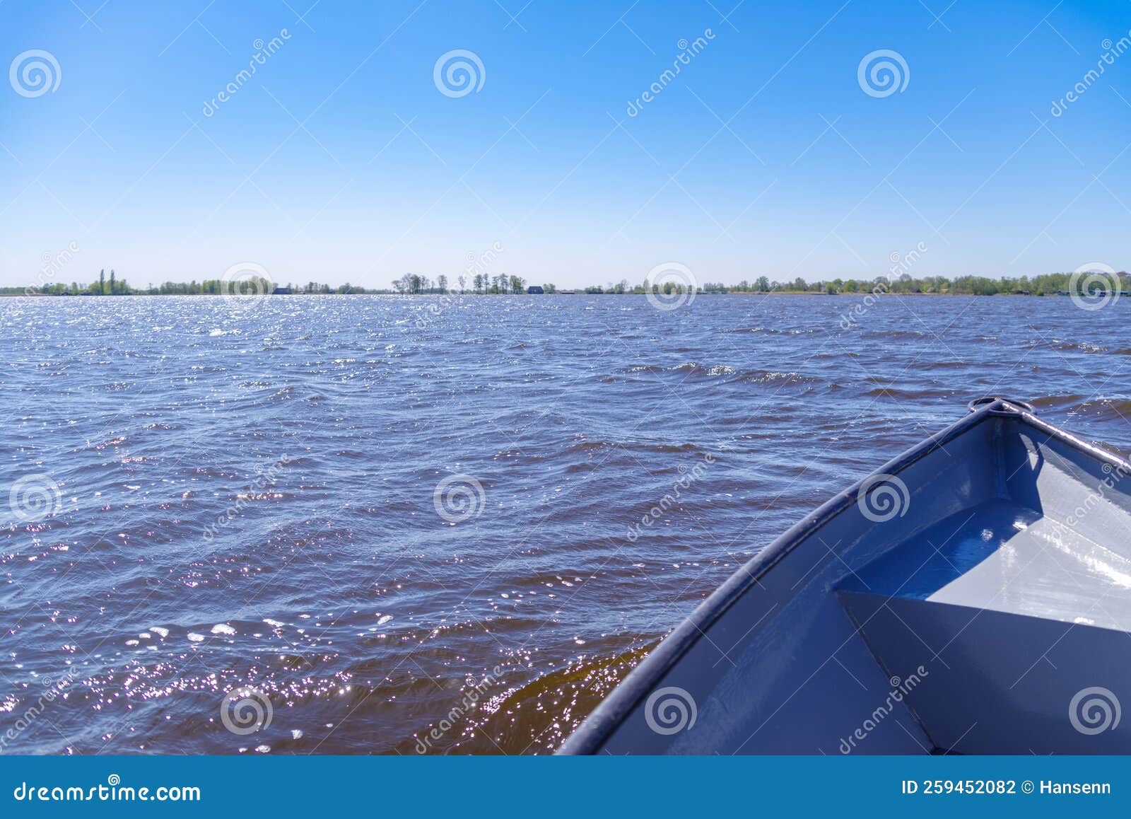 Rowing boat on lake stock photo. Image of destination 259452082