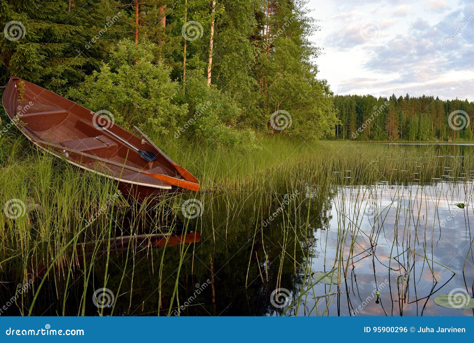A Rowing Boat on the Lake Shore. Stock Photo Image of scandinavia