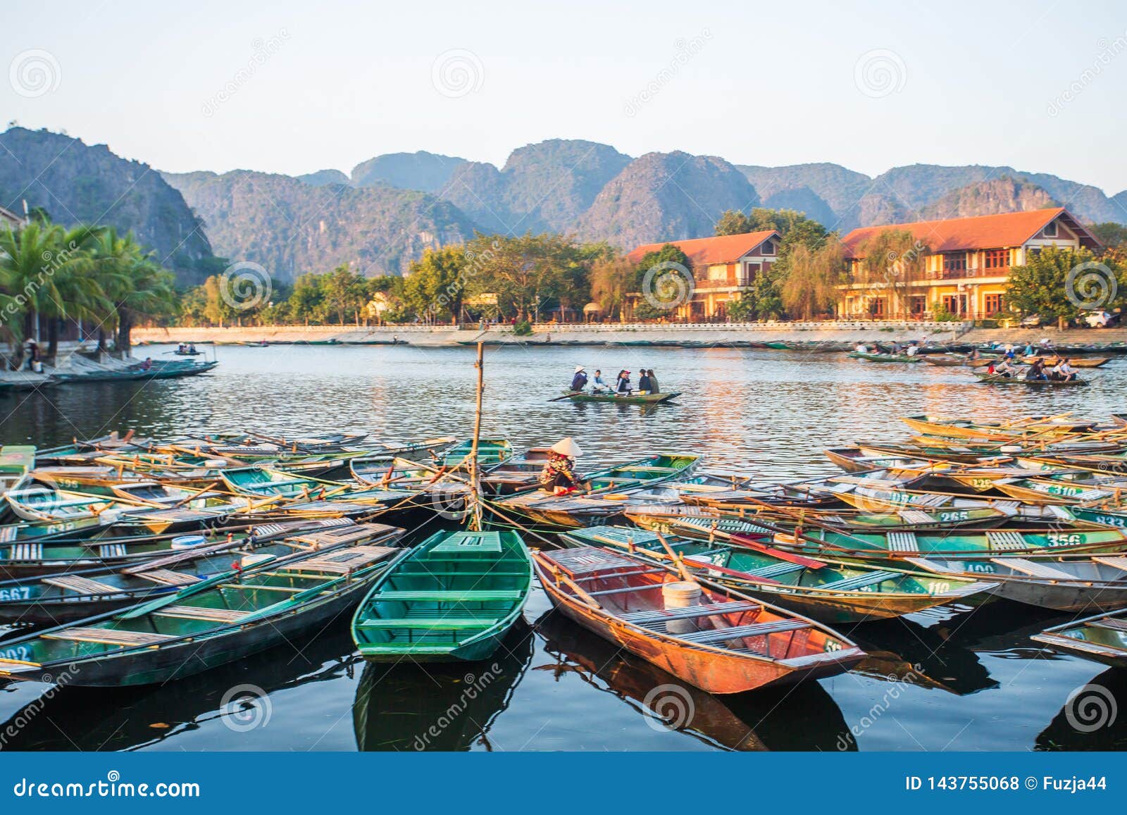 Rowing boat Waiting for passengers at sunrise, Hoa Lu Tam Coc, Hoi An Ancient Town, Vietnam. Rowing boat Waiting for passengers at sunrise,Hoa Lu Tam Coc,Hoi An Ancient Town,Vietnam.