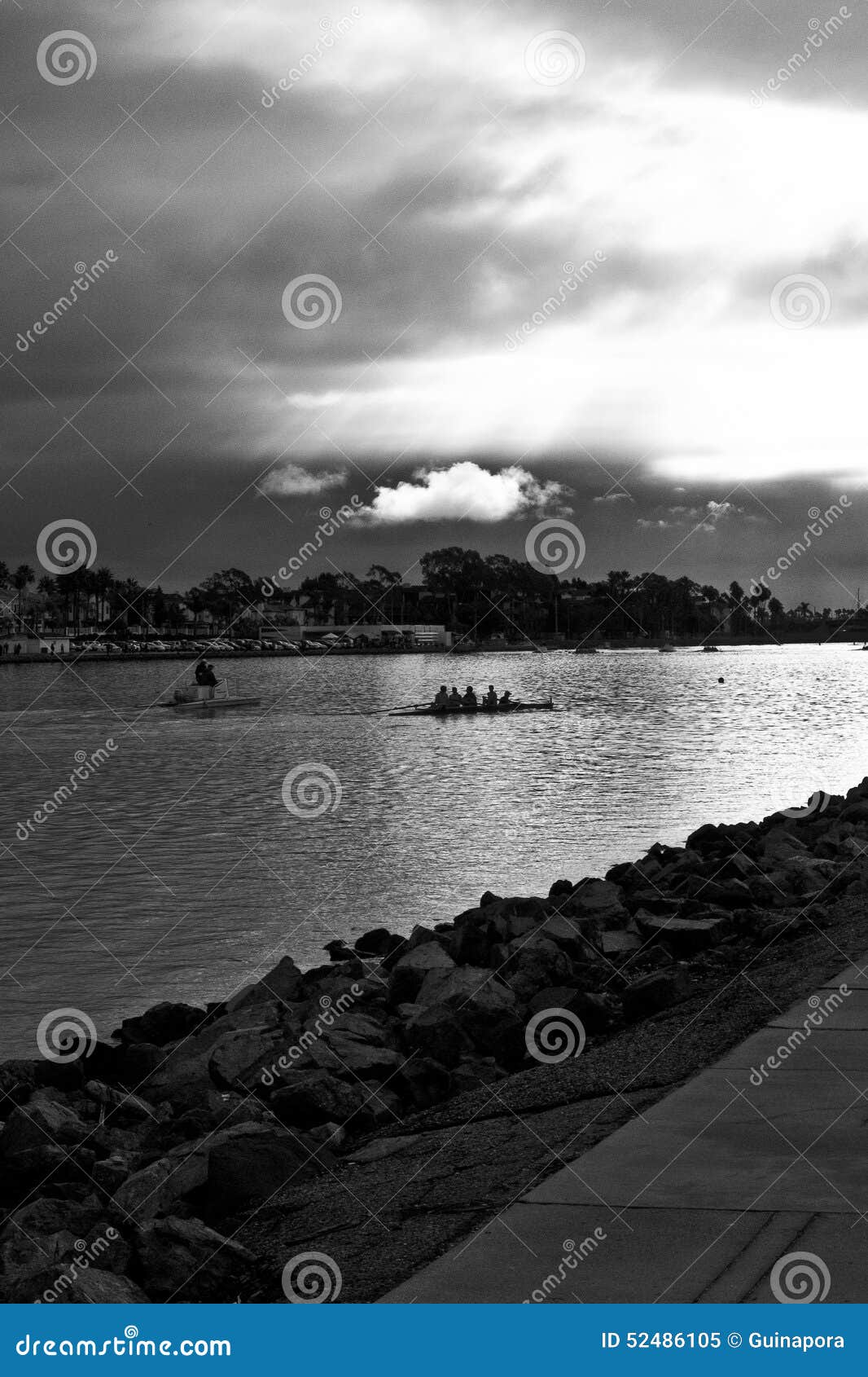 Rowing Team stock image. Image of storm, black, shore 52486105
