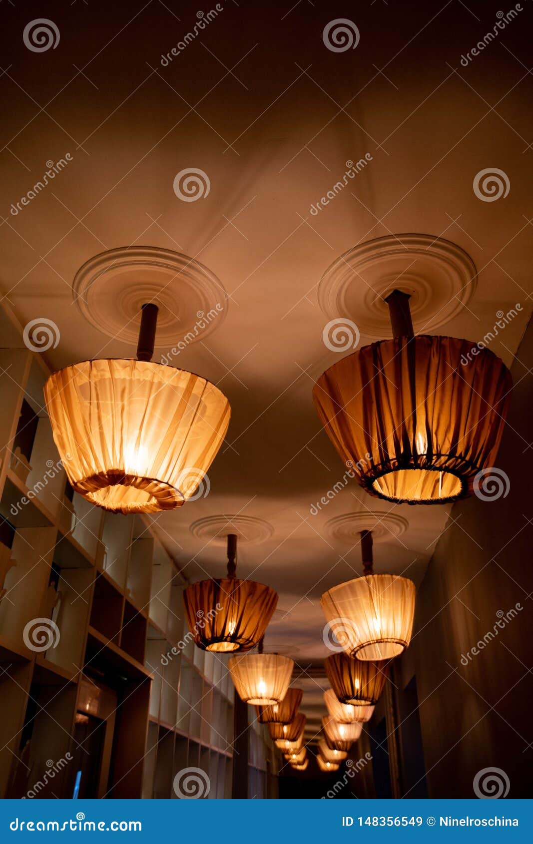 Rows Of Ceiling Lamps With Retro Style Lampshades Draped With