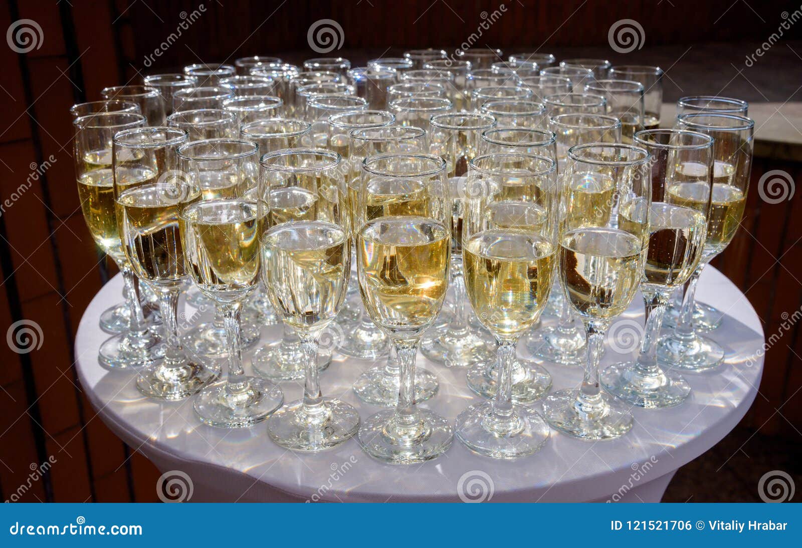 Rows of Champagne and Wine Glasses for Party and Wedding Stock Photo