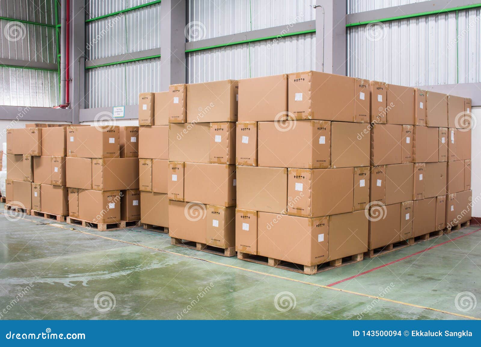 Rows of Material Boxes or Product Boxes in Warehouse Area Stock Photo