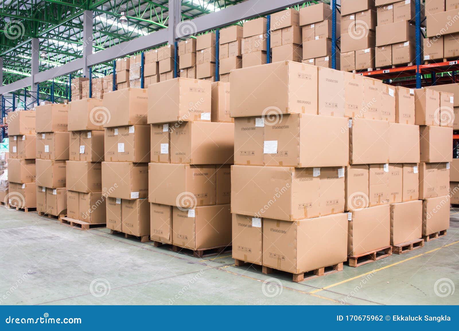 Rows of Material Boxes or Product Boxes in Warehouse Area Stock Photo
