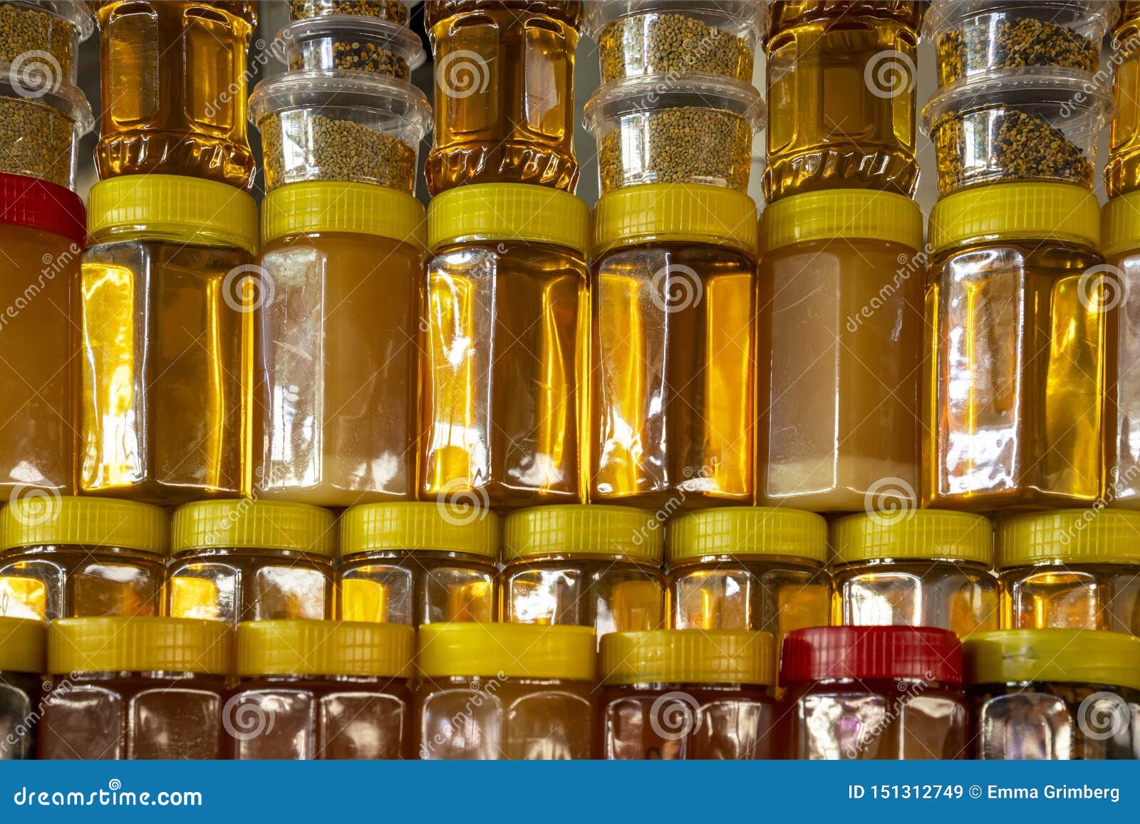 Rows of Plastic Jars Filled with Honey Stock Image Image of nutrition