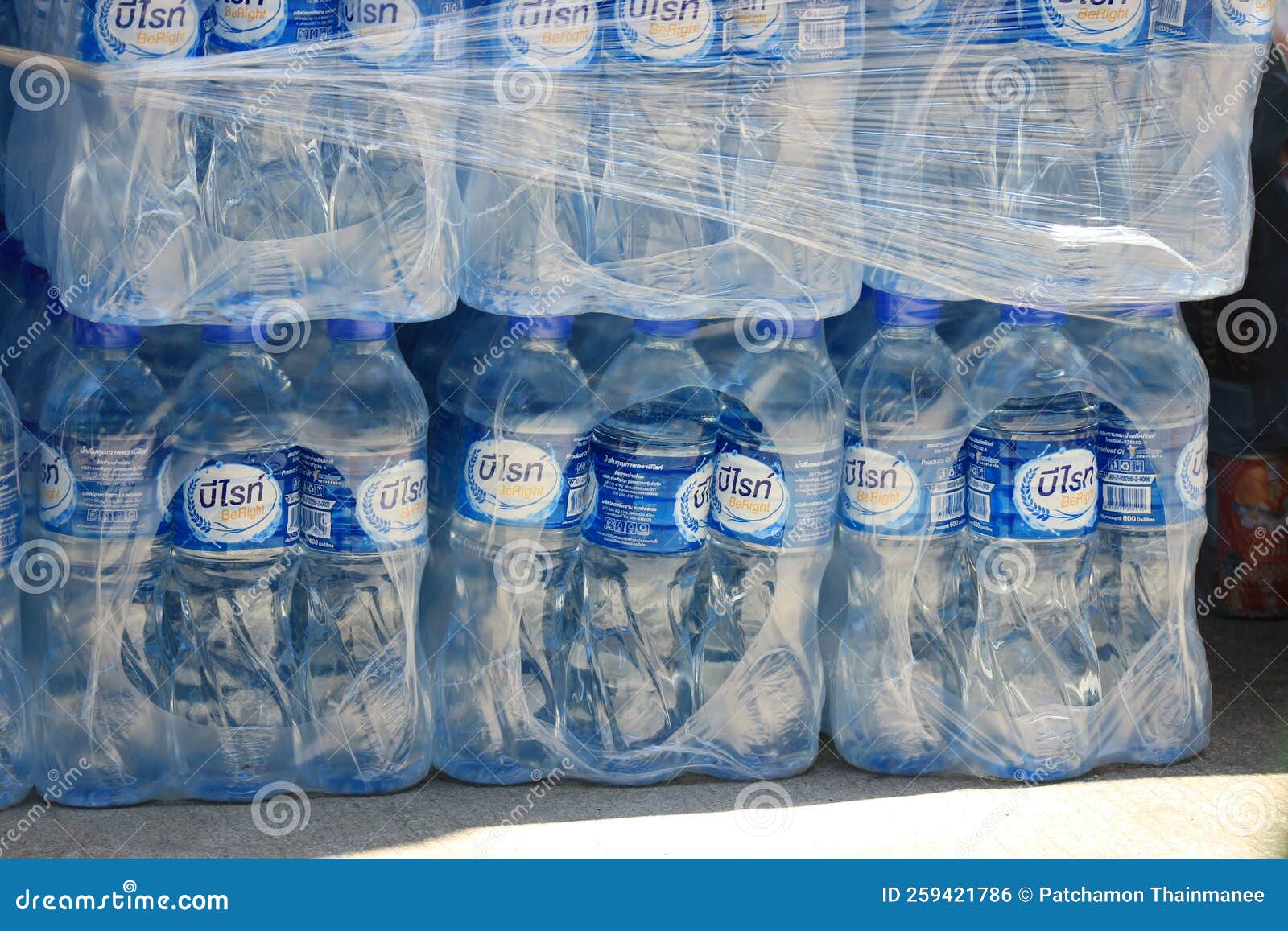 Rows Of Plastic Water Bottles Stacked In Bulk For Sale Editorial Photo rows-of-plastic-water-bottles-stacked-in-bulk-for-sale-editorial-photo