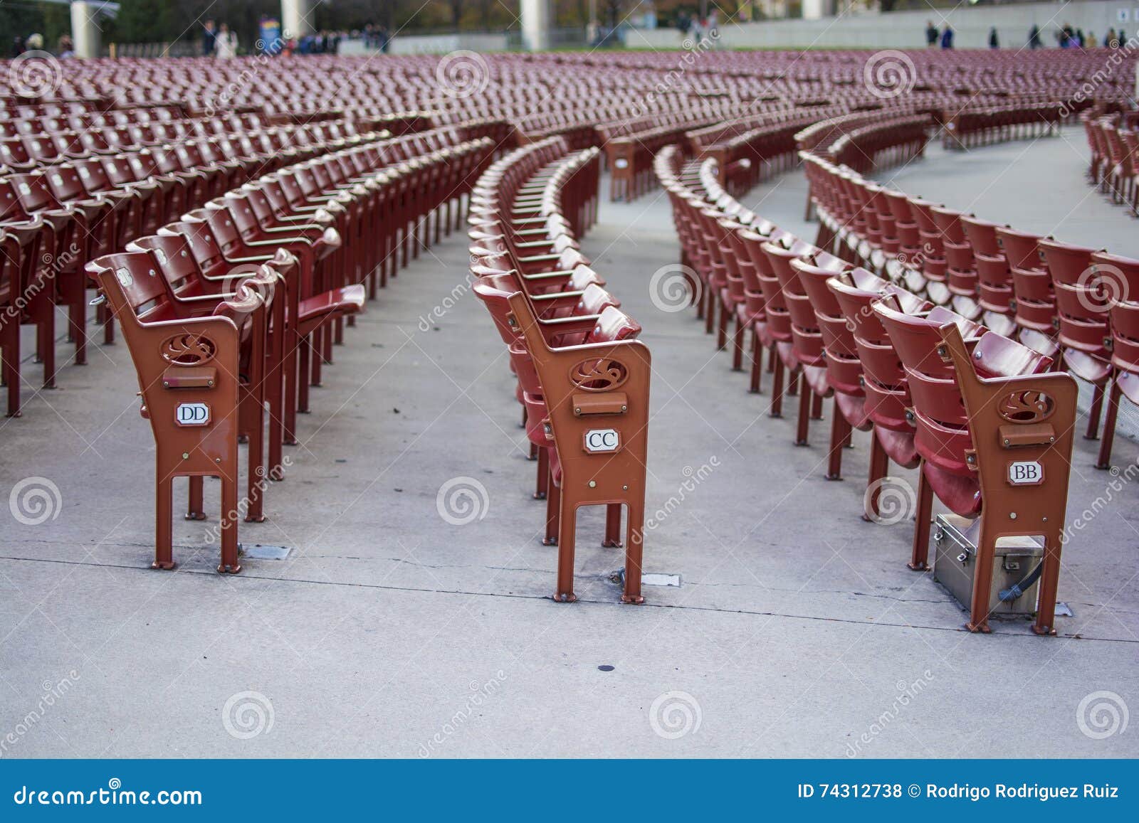 rows of red chairs in the auditorium