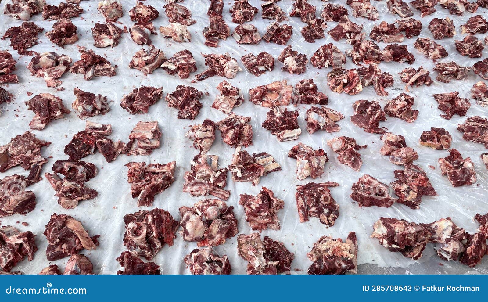 rows of sacrificial meat cuts prepared by the indonesian muslim community