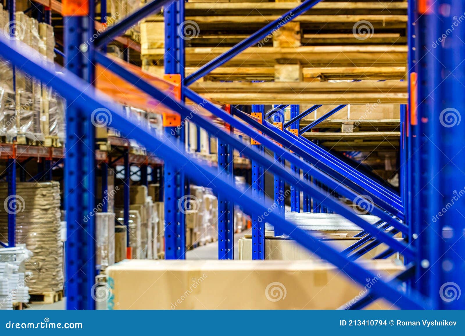 Rows of Shelves with Boxes in Factory Warehouse Close Up Stock Photo