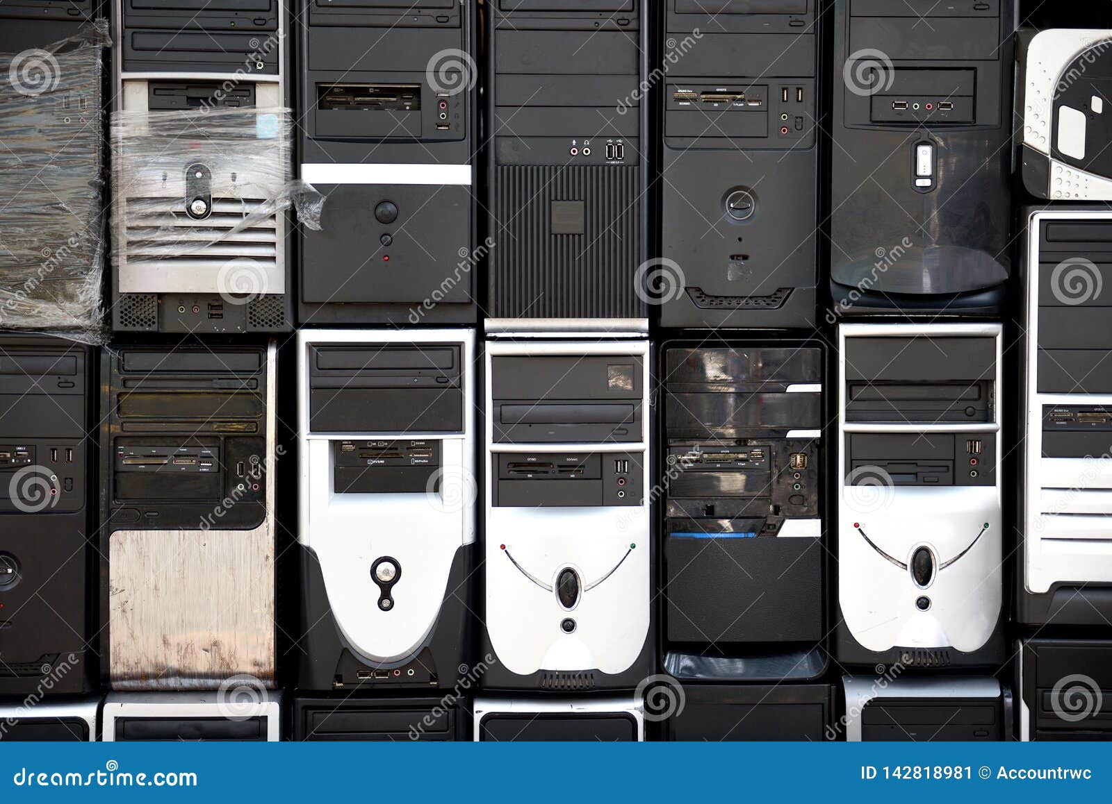 Rows Of Stacked Used Outdated Desktop Computer Towers Stock